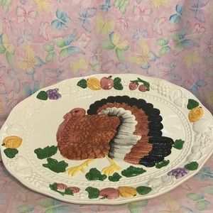 Turkey platter never used. Very pretty. Can be used either for serving or decor